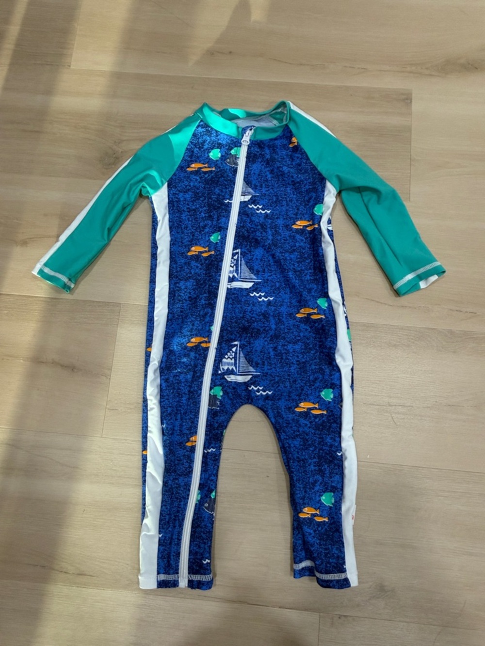 SwimZip Sunsuit - Long Sleeve Romper Swimsuit | "Captain Kid"